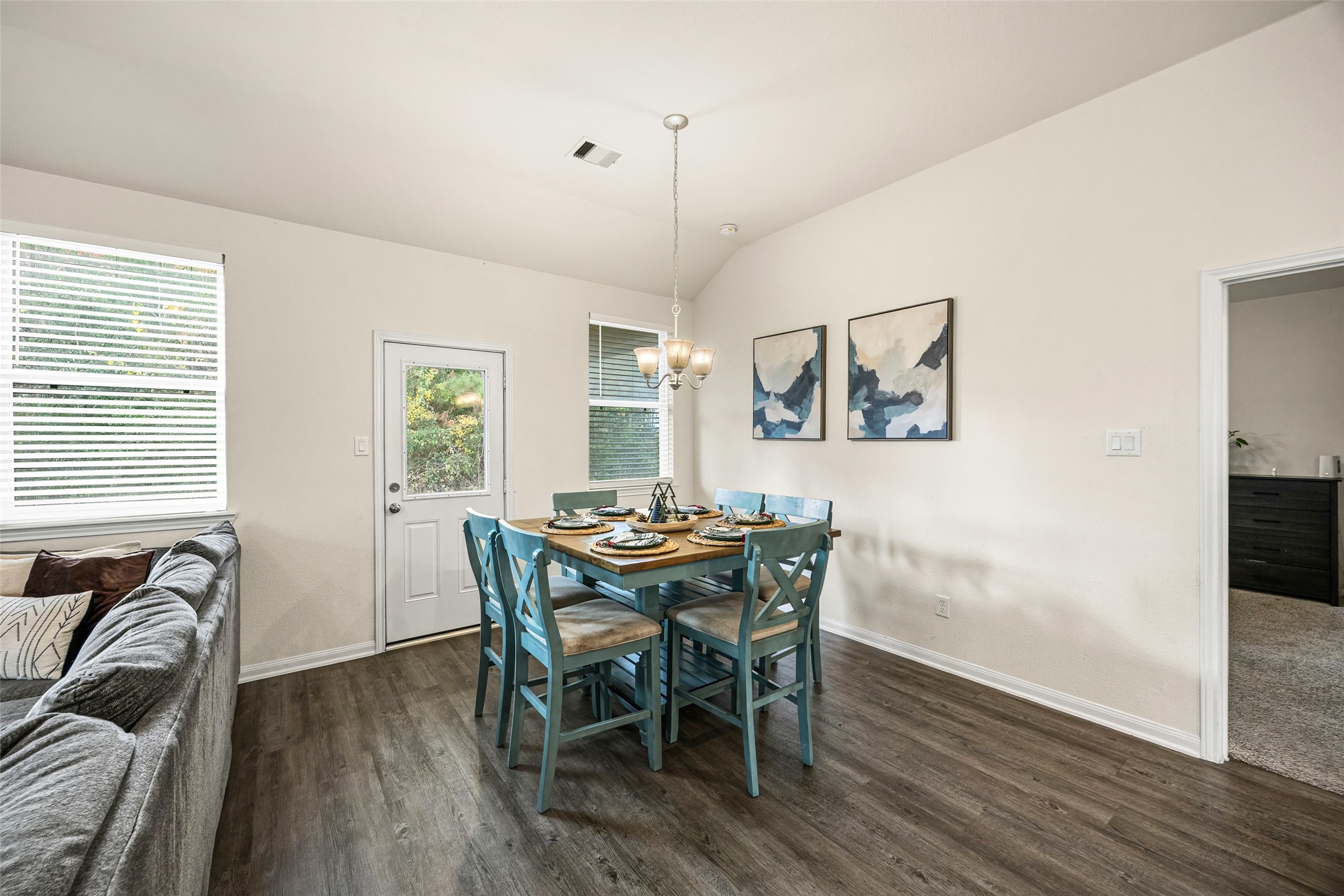 156 County Road Cleveland, TX 77327 - Photo 14 of 26 a view of a dining room with furniture window and wooden floor