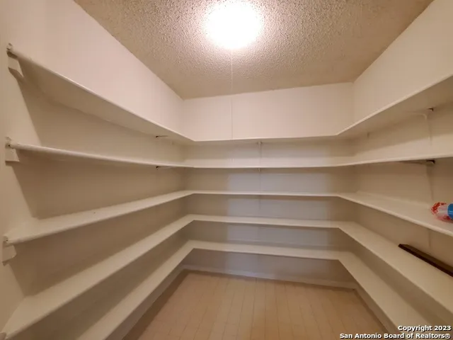 a view of room with shelves