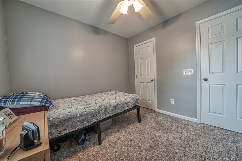 808 Dillard Road Rock Hill, SC 29730 - Photo 24 of 29 a bedroom with a bed and a window