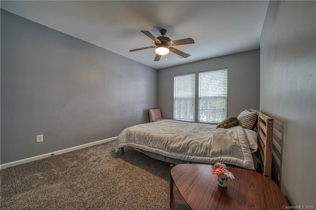 808 Dillard Road Rock Hill, SC 29730 - Photo 26 of 29 a bedroom with a bed and window