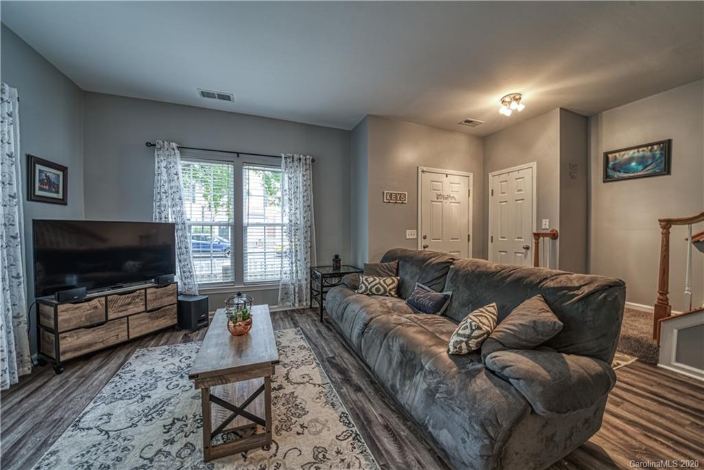 808 Dillard Road Rock Hill, SC 29730 - Photo 8 of 29 a living room with furniture and a flat screen tv