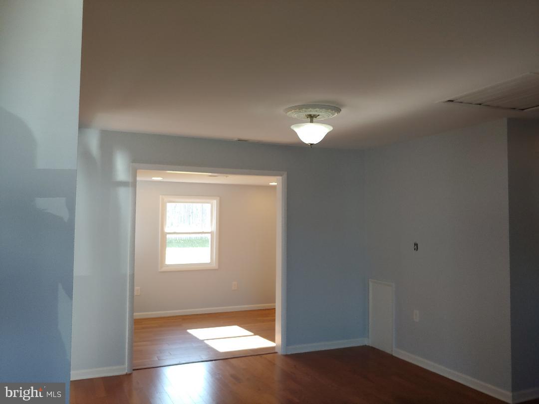 8725 Stockwell Road Baltimore, MD 21234 - Photo 6 of 9 dining-room looking into the family room