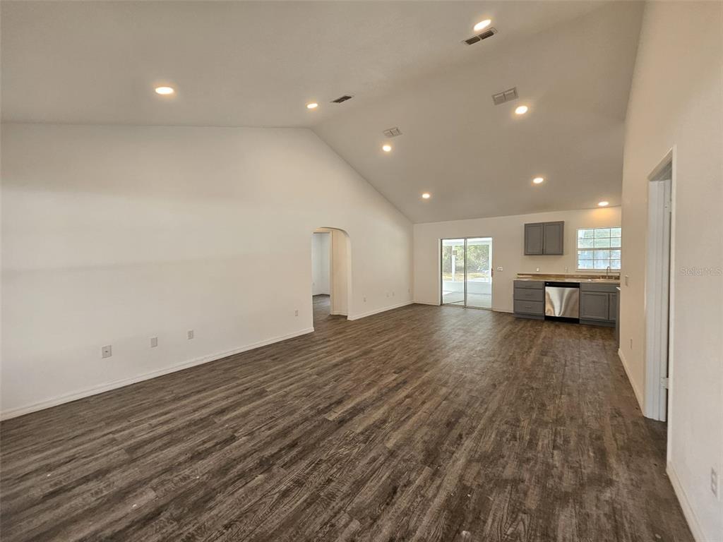 4 Cedar Trace Way Ocala, FL 34472 - Photo 19 of 36 a view of empty room with wooden floor