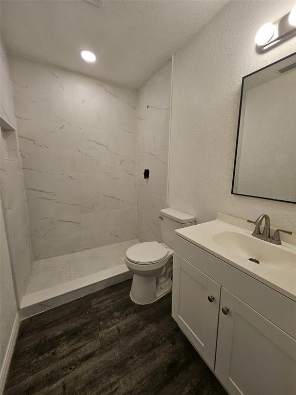 4 Cedar Trace Way Ocala, FL 34472 - Photo 29 of 36 a bathroom with a sink a toilet and shower