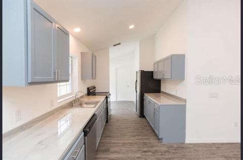 4 Cedar Trace Way Ocala, FL 34472 - Photo 6 of 36 a large kitchen with a lot of counter space