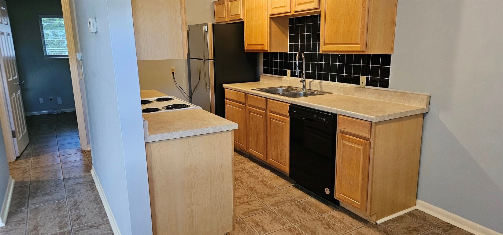 1411 Braes Ridge Drive, Unit B Austin, TX 78723 - Photo 18 of 37 a utility room with dryer and washer
