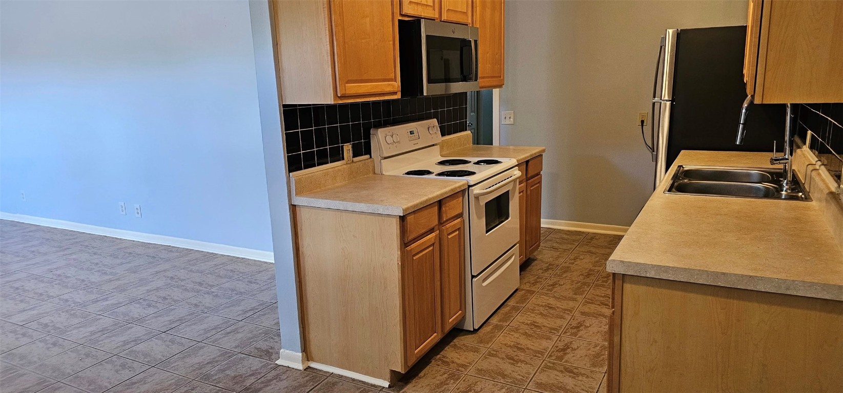 1411 Braes Ridge Drive, Unit B Austin, TX 78723 - Photo 19 of 37 a utility room with dryer and washer