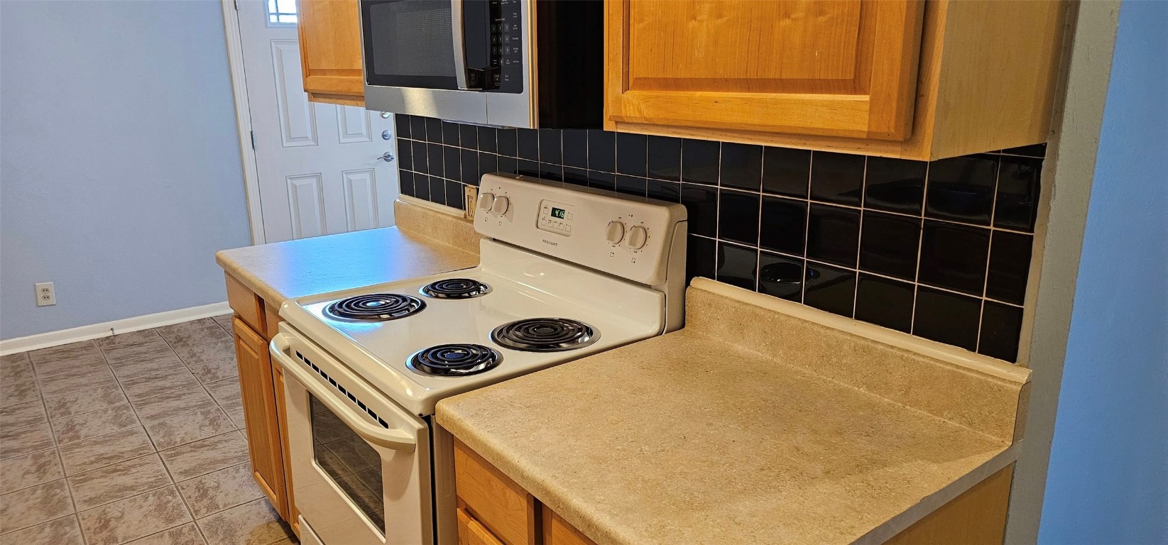 1411 Braes Ridge Drive, Unit B Austin, TX 78723 - Photo 20 of 37 a utility room with washer and dryer