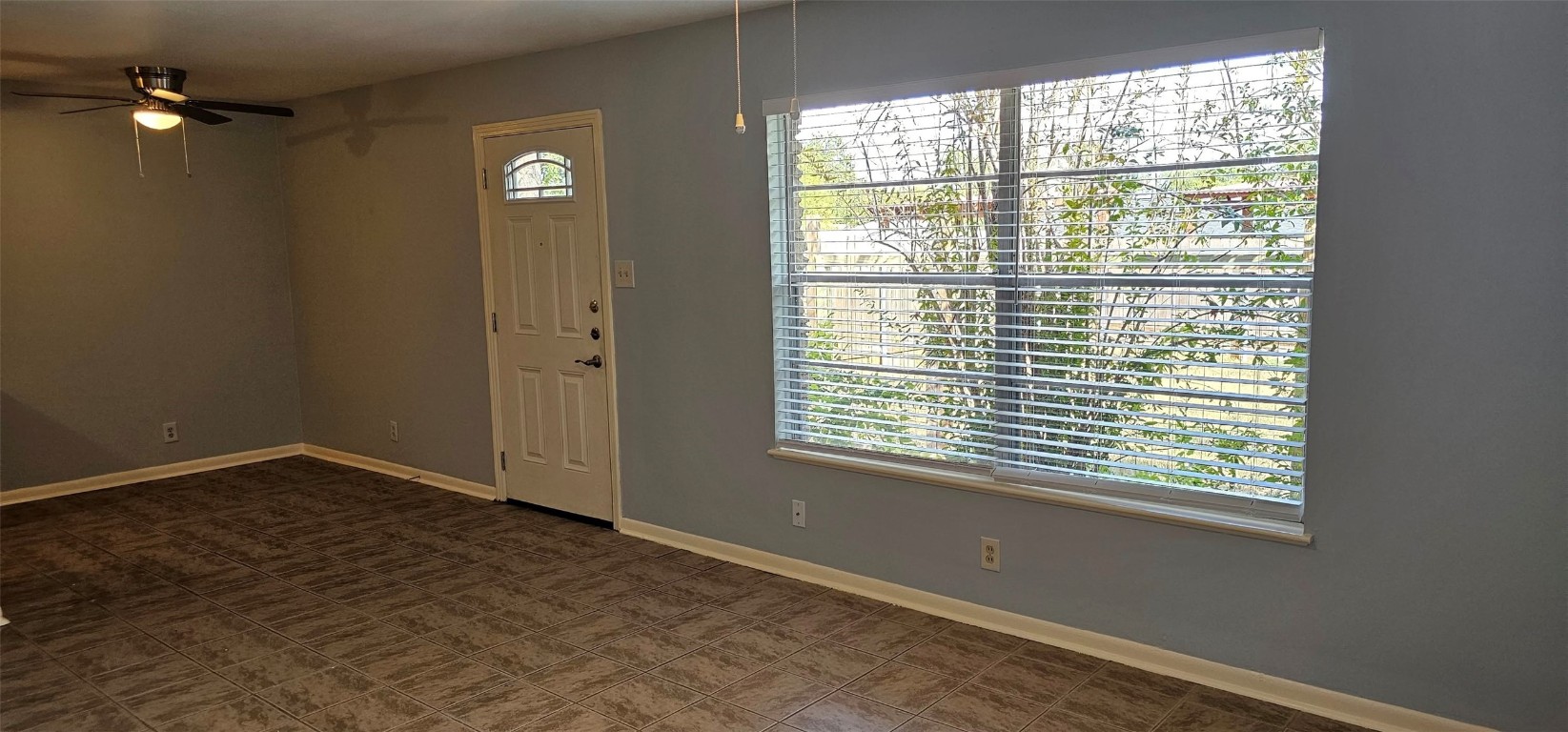1411 Braes Ridge Drive, Unit B Austin, TX 78723 - Photo 22 of 37 a view of an empty room with a window