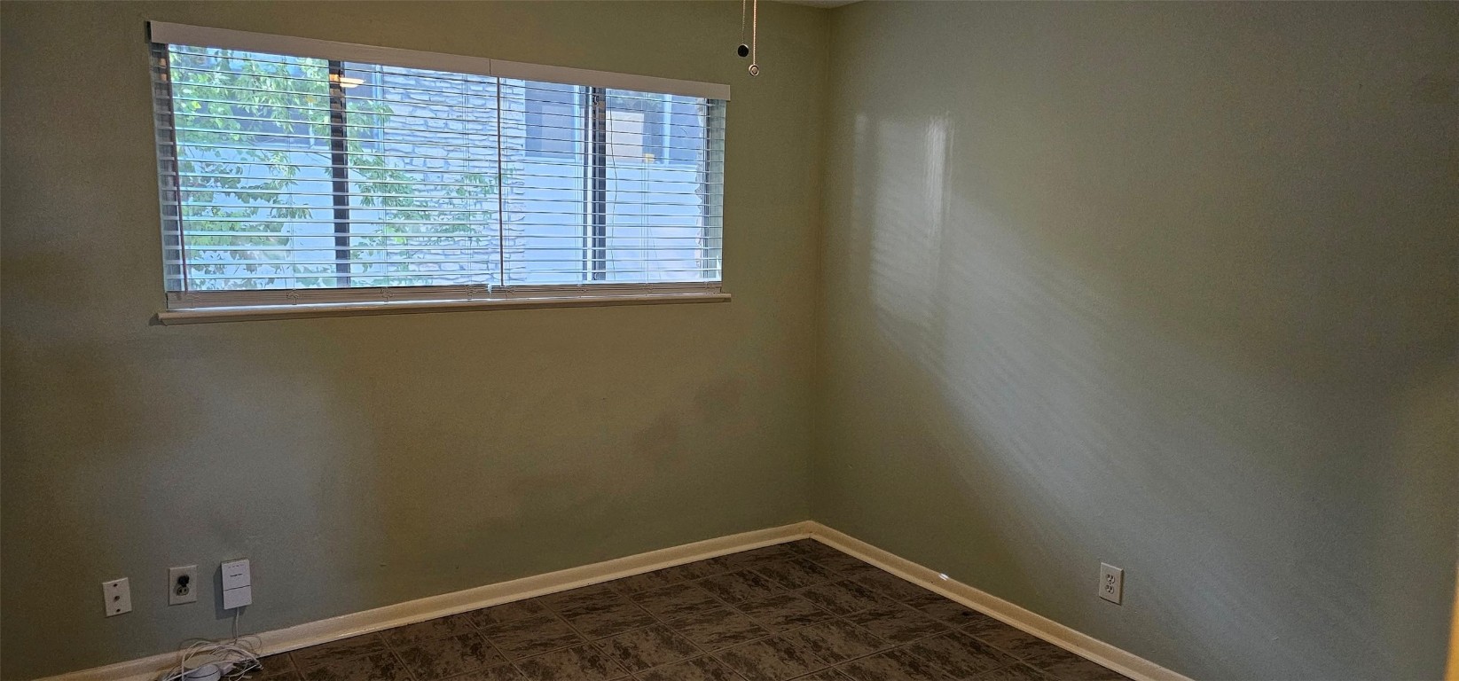 1411 Braes Ridge Drive, Unit B Austin, TX 78723 - Photo 26 of 37 an empty room with a window