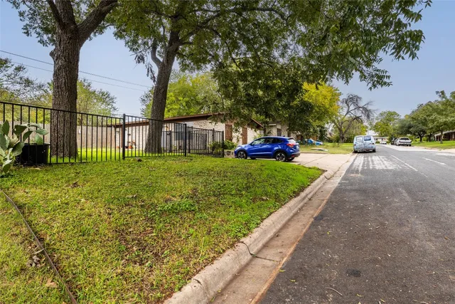 a view of a garden with a bench