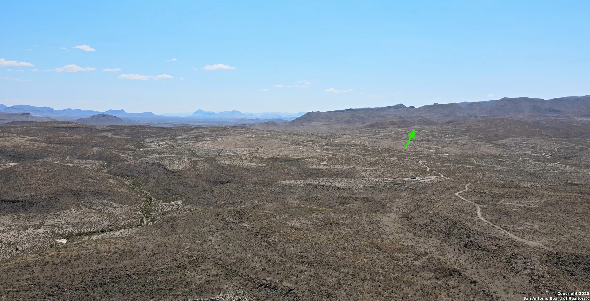 a view of an outdoor space with mountain view