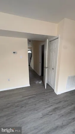 a view of a livingroom with wooden floor