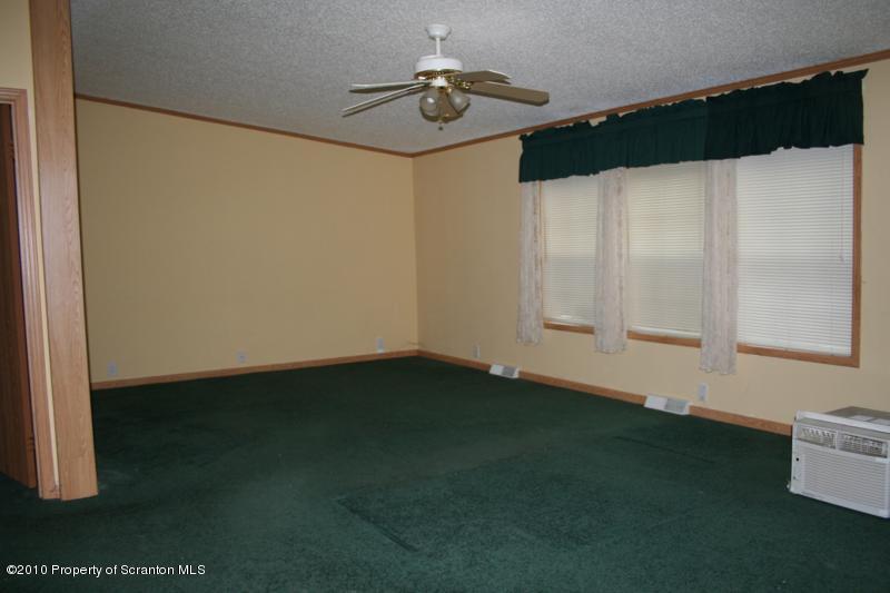 351 R Casterline Road Dallas, PA 18612 - Photo 10 of 13 a kitchen with a refrigerator and a stove