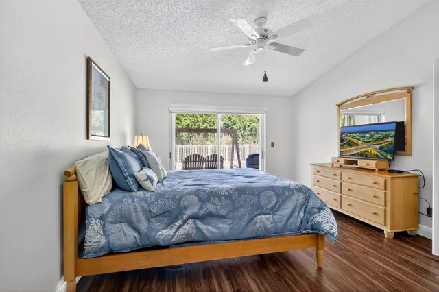 a bed room with a bed and a lamp