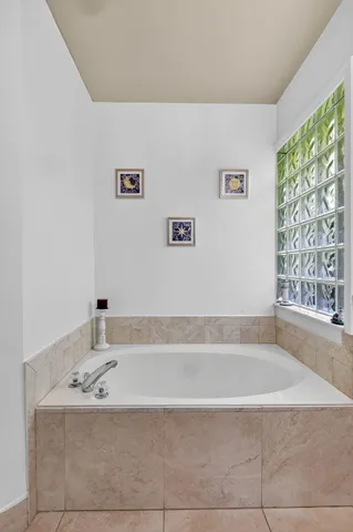 a bathroom with a sink and a bathtub