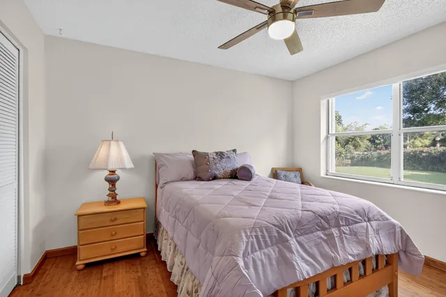 a bedroom with a bed and closet