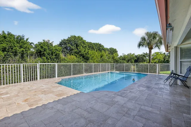 a view of a garden with a lake