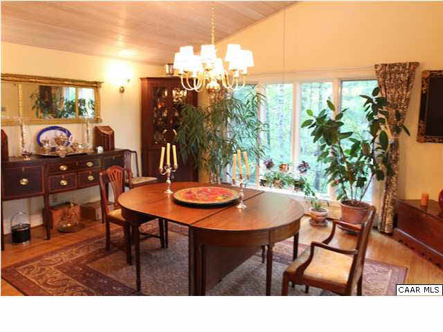 3420 Horseshoe Bend Road Charlottesville, VA 22901 - Photo 8 of 30 The dining room also has a cathedral ceiling and opens to the deck.