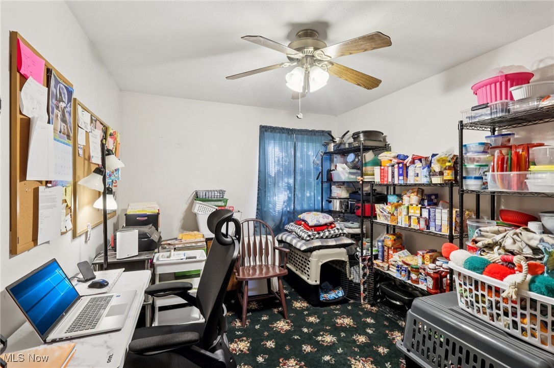 6370 Trumbull Road Geneva, OH 44041 - Photo 21 of 50 Office area with a ceiling fan and carpet floors