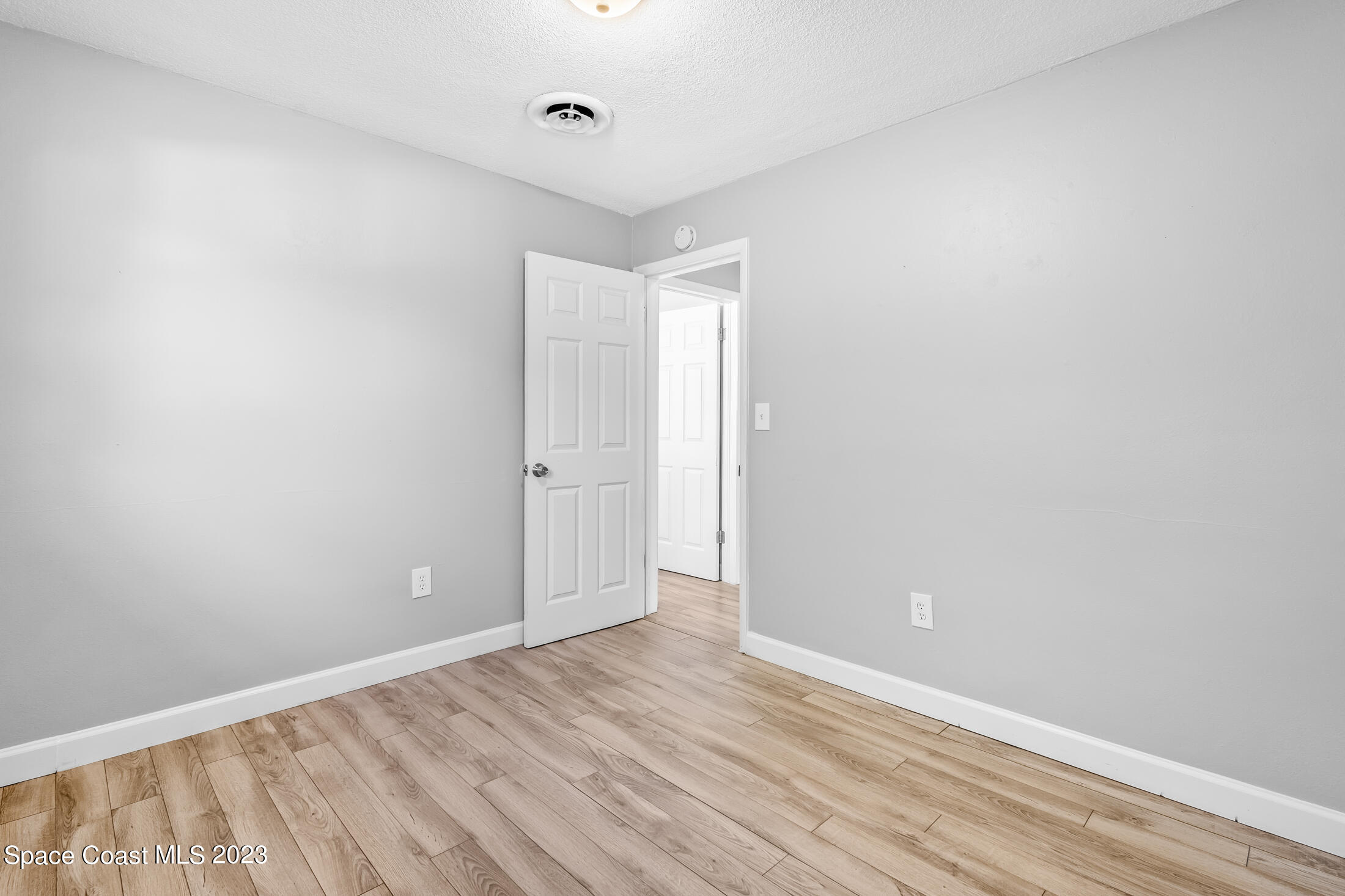 696 Teak Drive Melbourne, FL 32935 - Photo 13 of 22 a view of an empty room