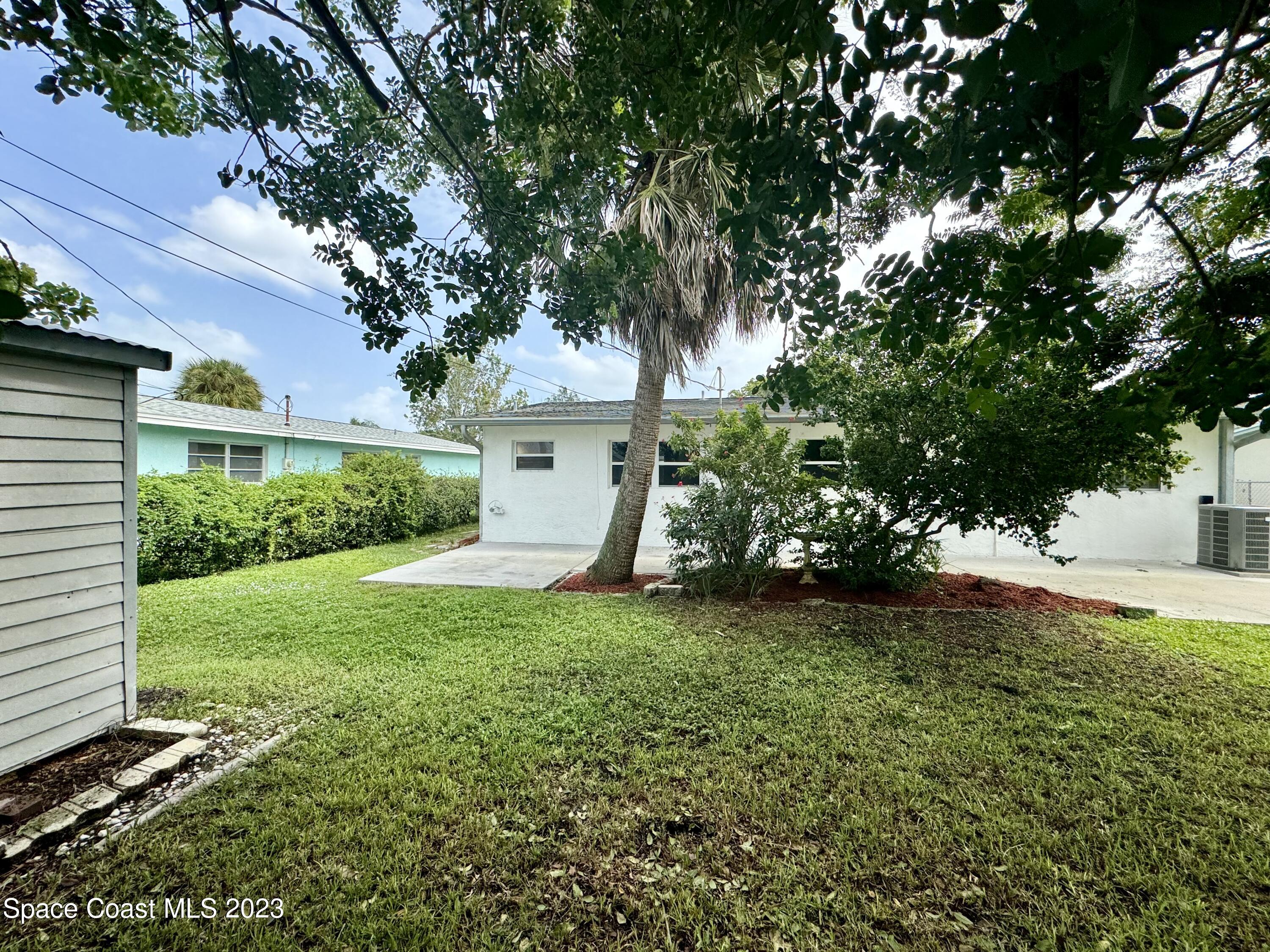 696 Teak Drive Melbourne, FL 32935 - Photo 22 of 22 a view of a backyard