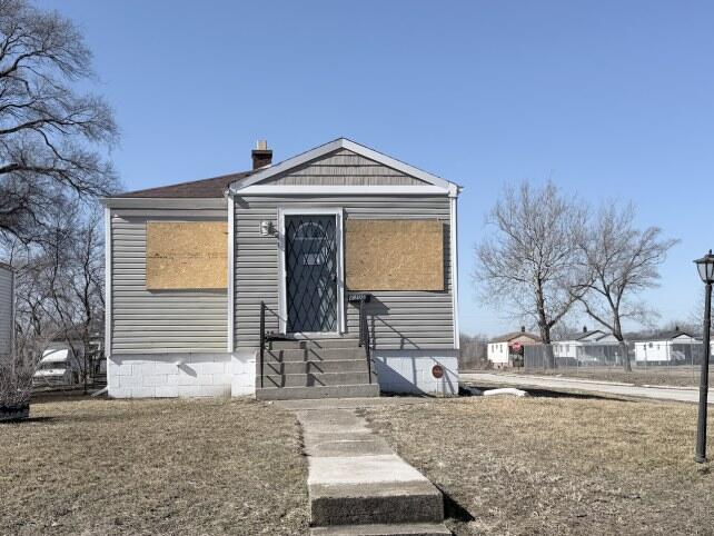 2300 Fillmore Street Gary, IN 46407 - Photo 1 of 16 a front view of a house with trees