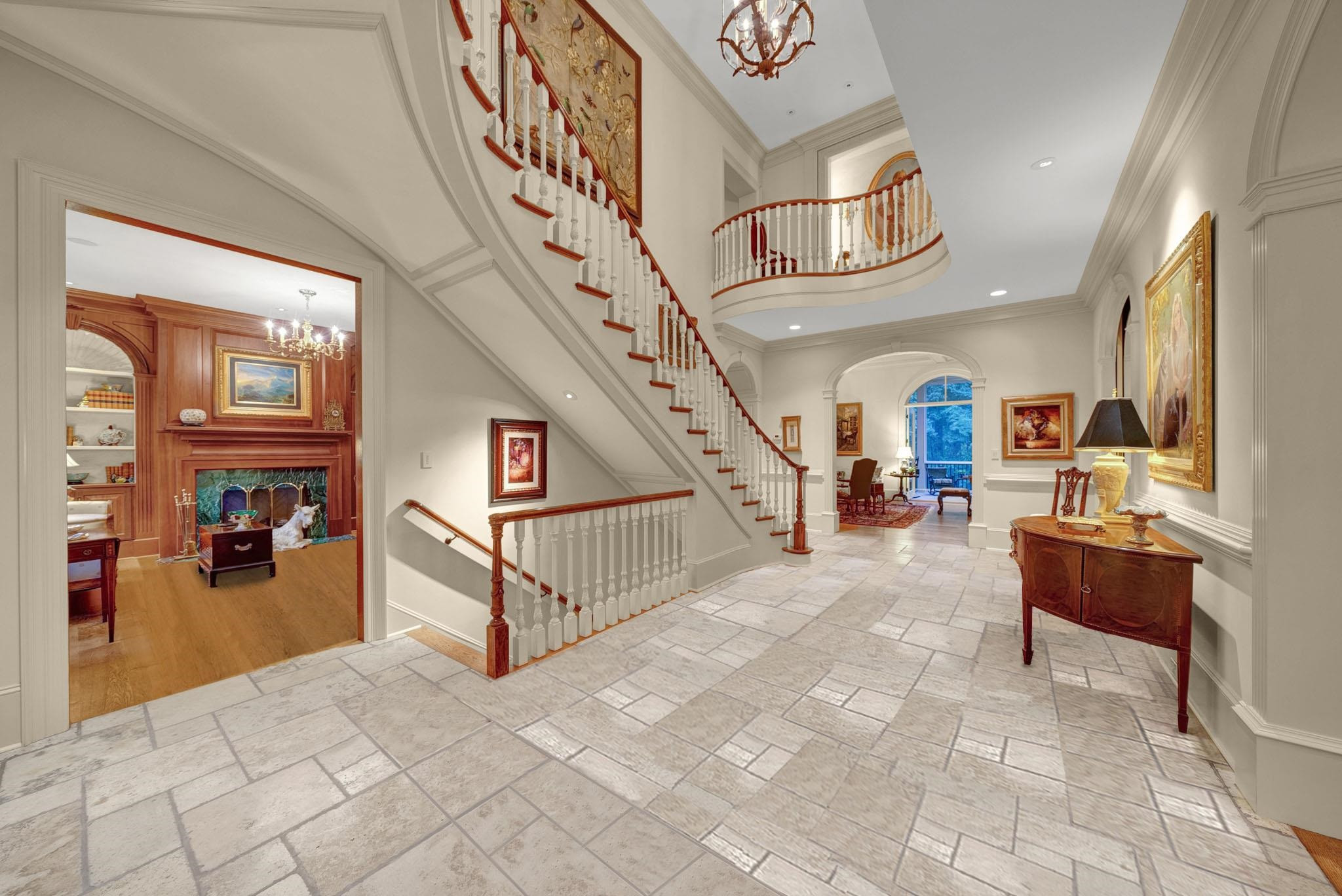 6036 Over Hadden Court Raleigh, NC 27614 - Photo 11 of 30 Gorgeous 2 story foyer w/traventine tile floors. Custom carved balusters. This custom built home by John Rufty shows the quality of the house and attention to detail. Foyer