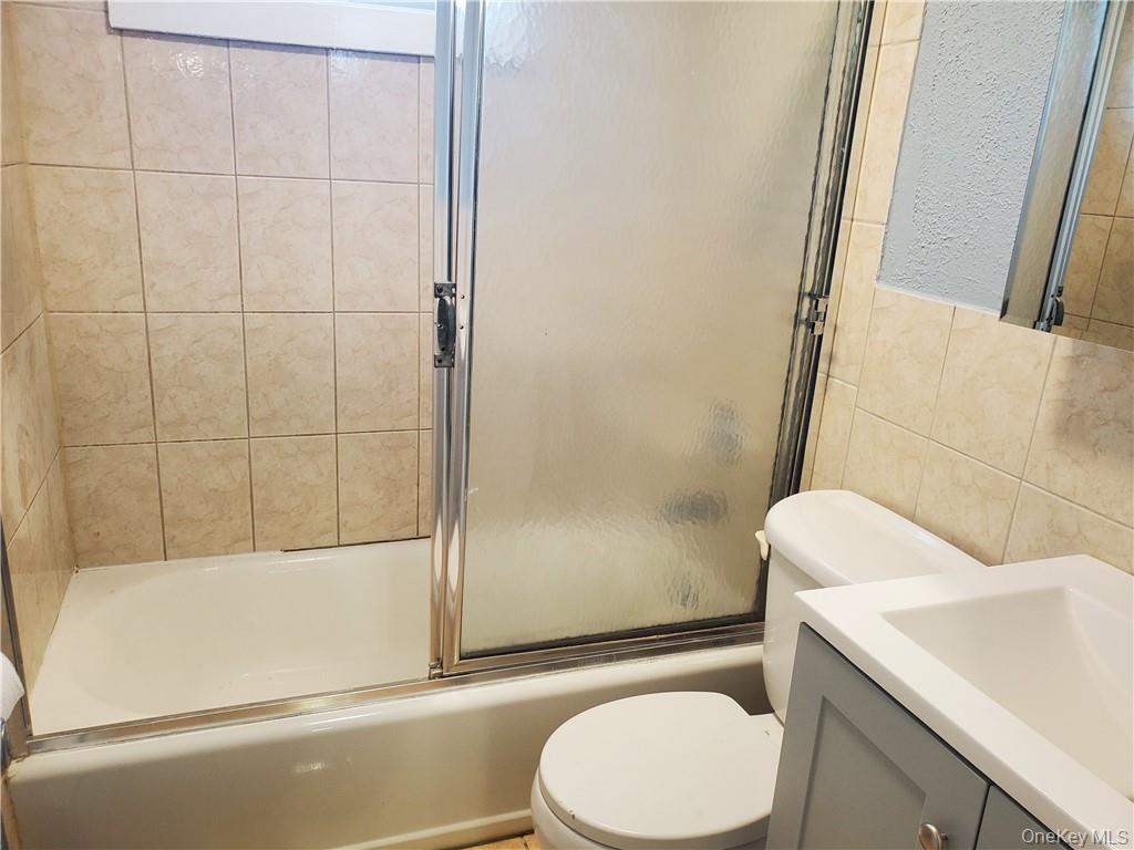 76 State Street, Unit 10 Ossining, NY 10562 - Photo 13 of 23 a bathroom with a sink and toilet