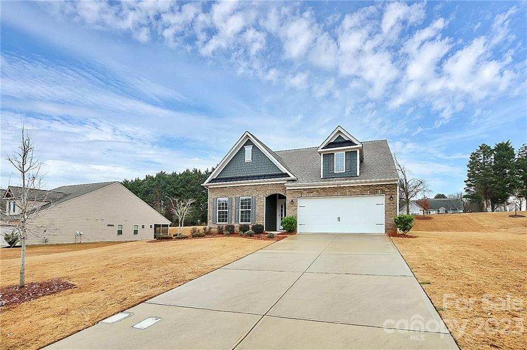 227 Houston Blair Road Matthews, NC 28104 - Photo 2 of 39 a view of house with yard