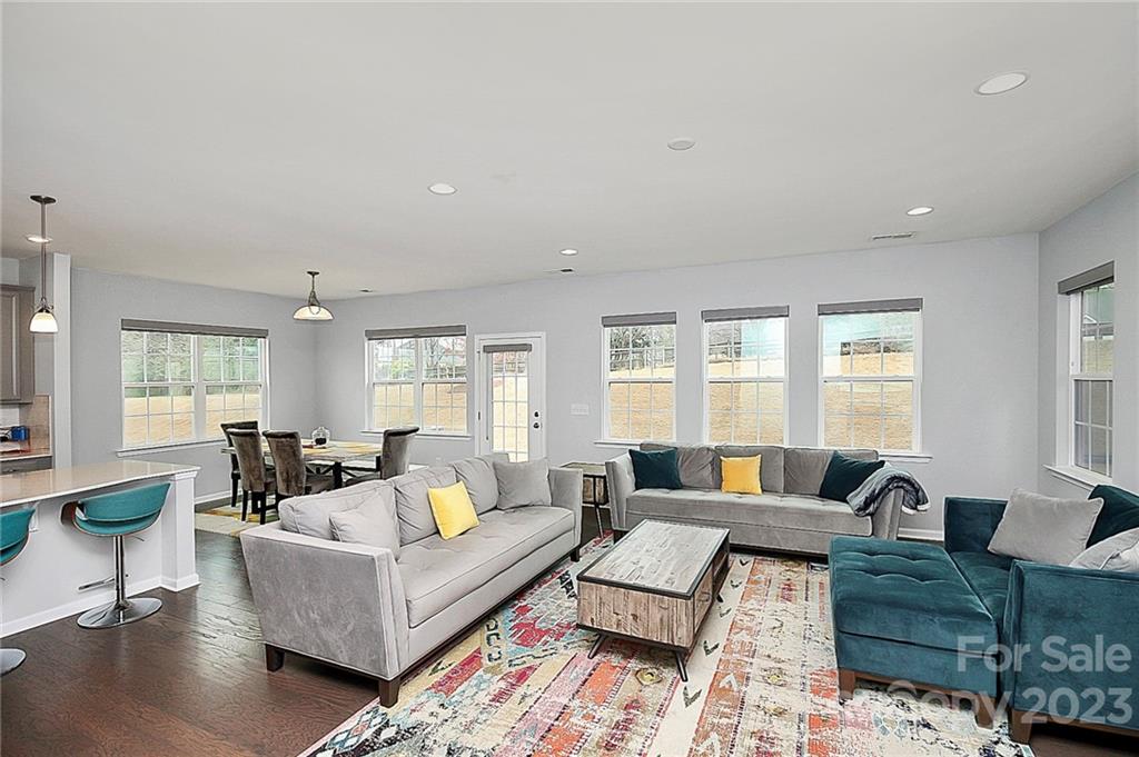 227 Houston Blair Road Matthews, NC 28104 - Photo 21 of 39 a living room with furniture and a large window