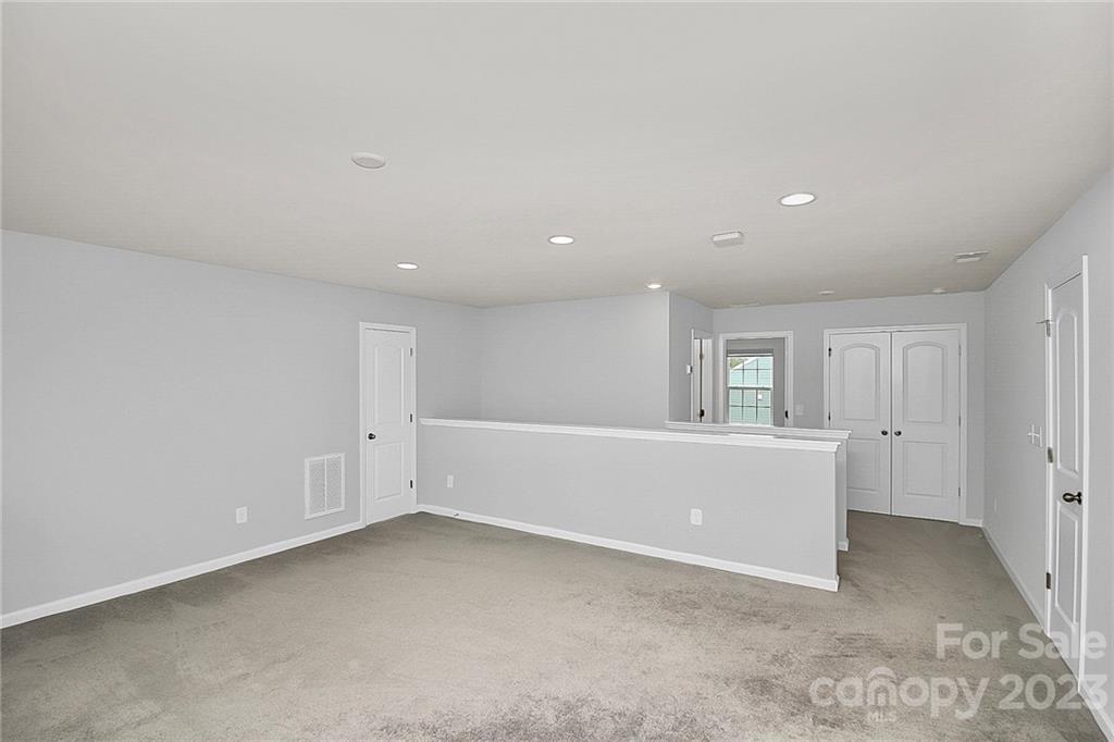 227 Houston Blair Road Matthews, NC 28104 - Photo 30 of 39 a view of an empty room