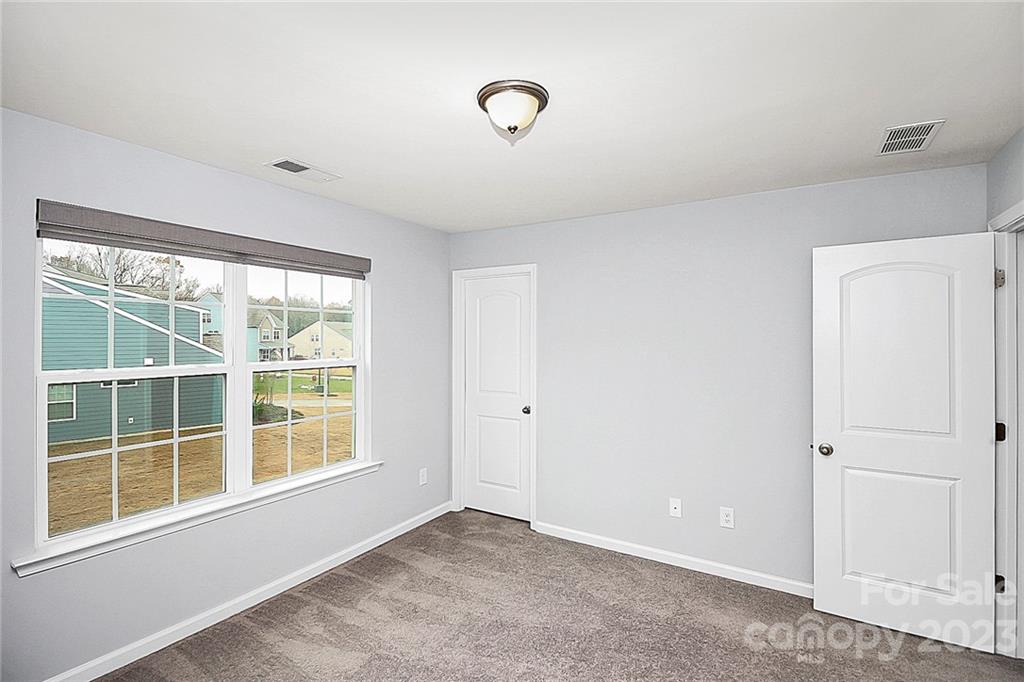227 Houston Blair Road Matthews, NC 28104 - Photo 33 of 39 a view of an empty room with a window