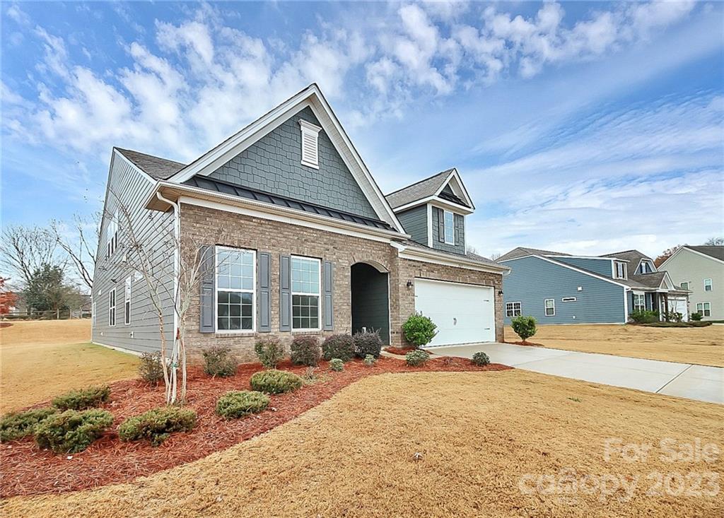 227 Houston Blair Road Matthews, NC 28104 - Photo 38 of 39 a front view of a house with garden