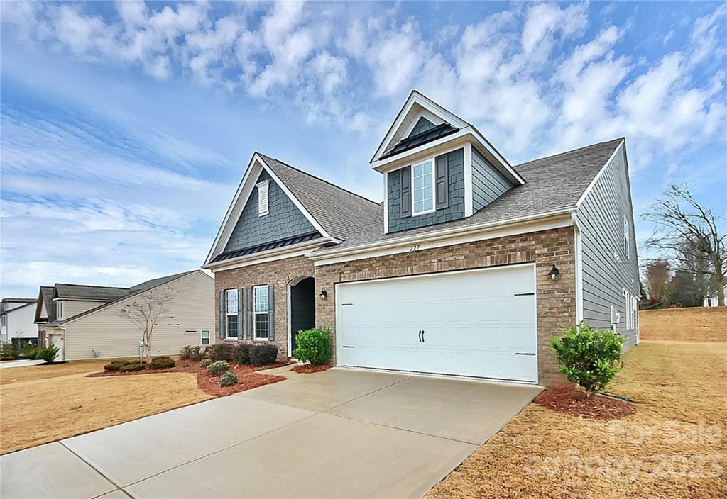 227 Houston Blair Road Matthews, NC 28104 - Photo 39 of 39 a view of a house with a yard and garage