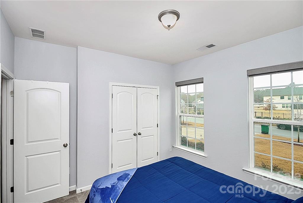 227 Houston Blair Road Matthews, NC 28104 - Photo 8 of 39 a view of room with window and hardwood floor