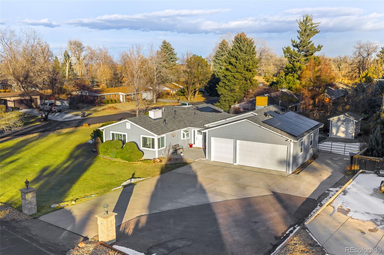 34 Skyline Drive Wheat Ridge, CO 80215 - Photo 44 of 45 a view of a swimming pool with an outdoor space and seating area