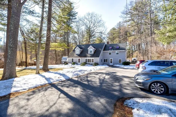 a car parked in front of a house