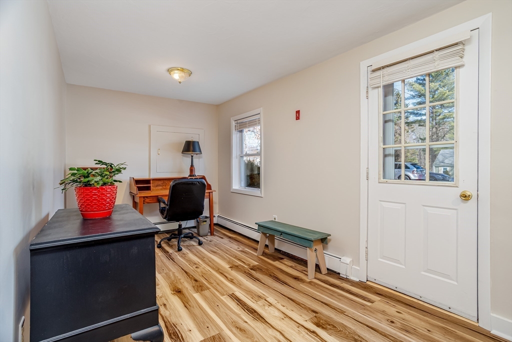 113 Parker Road, Unit 1 Lancaster, MA 01523 - Photo 3 of 30 a view of a workspace with furniture
