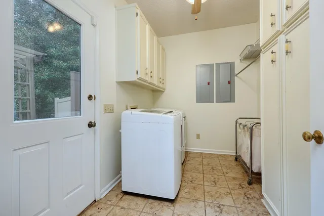 a bed room with a bed and a television