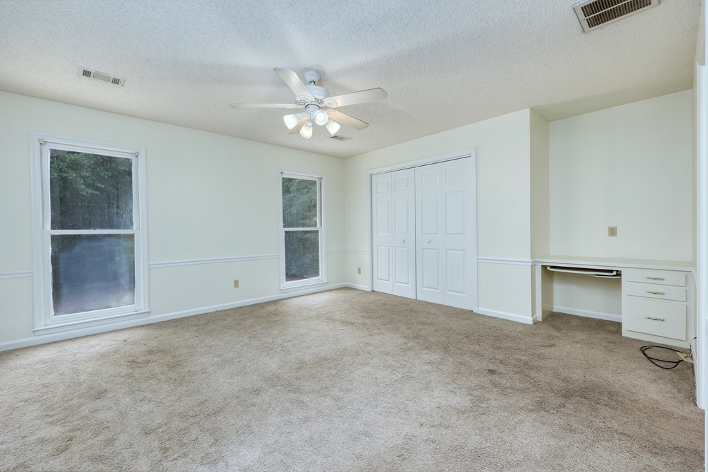 5135 Midland Trace Midland, GA 31820 - Photo 35 of 66 a view of an empty room with a window