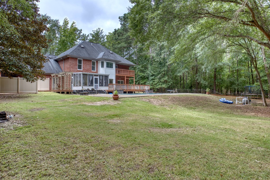 5135 Midland Trace Midland, GA 31820 - Photo 49 of 66 a view of a house with a yard