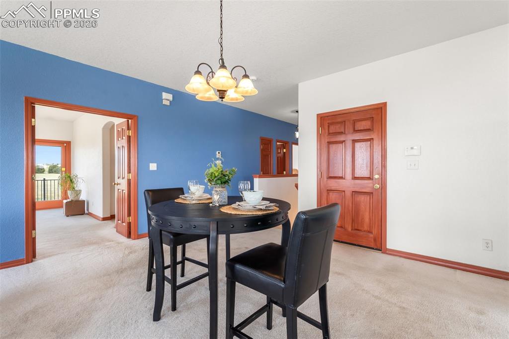 11424 McKissick Road Peyton, CO 80831 - Photo 6 of 33 Garage entry to main level