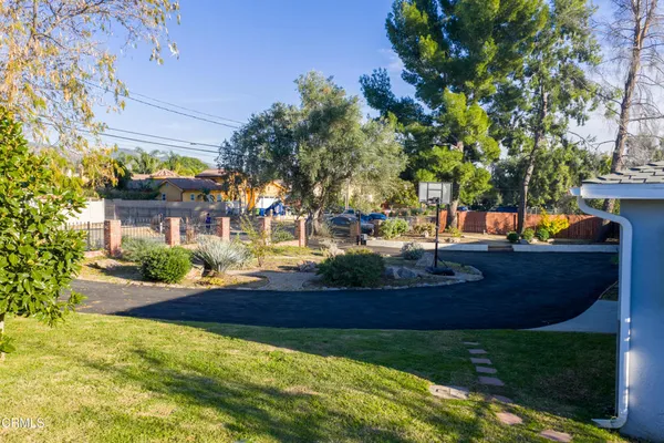 a view of yard with outdoor seating