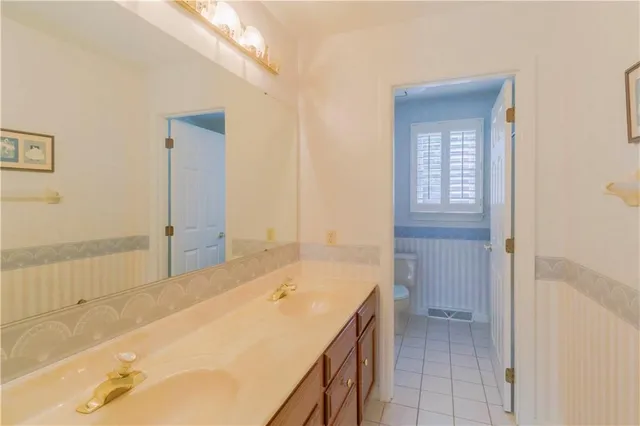 a view of a hallway with staircase