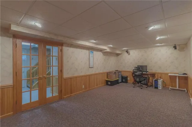 a view of an empty room with a fireplace