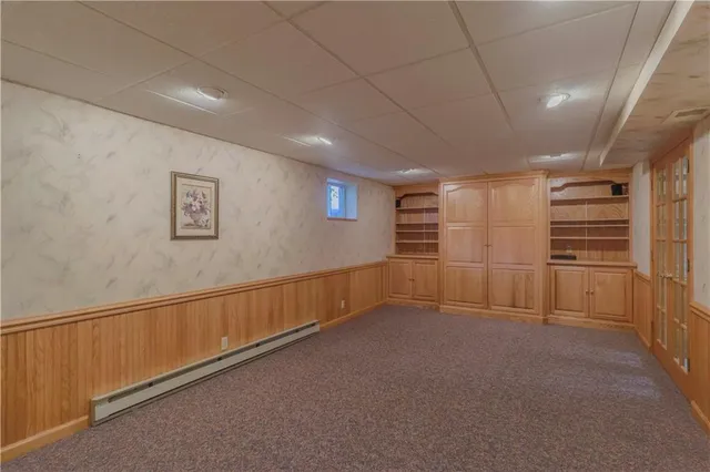 a room with storage and a utility room