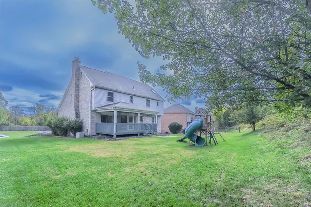 a view of backyard with a garden and plants