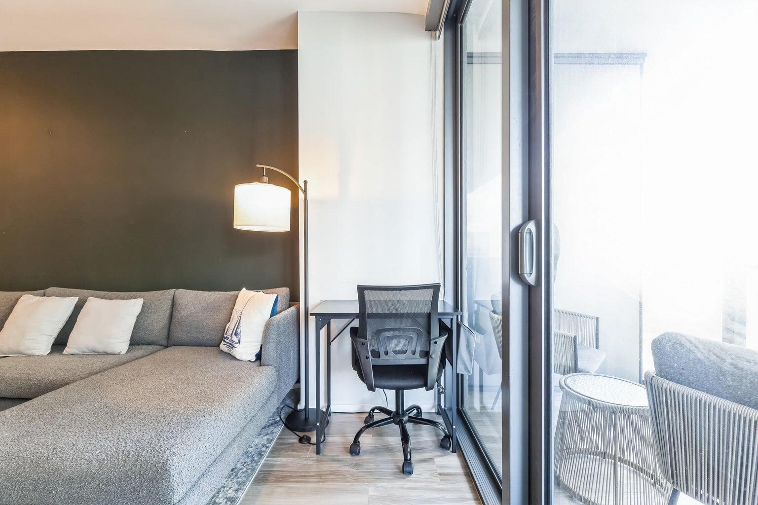 801 South Miami Avenue, Unit 3607 Miami, FL 33131 - Photo 15 of 38 a bedroom with a bed and a night stand