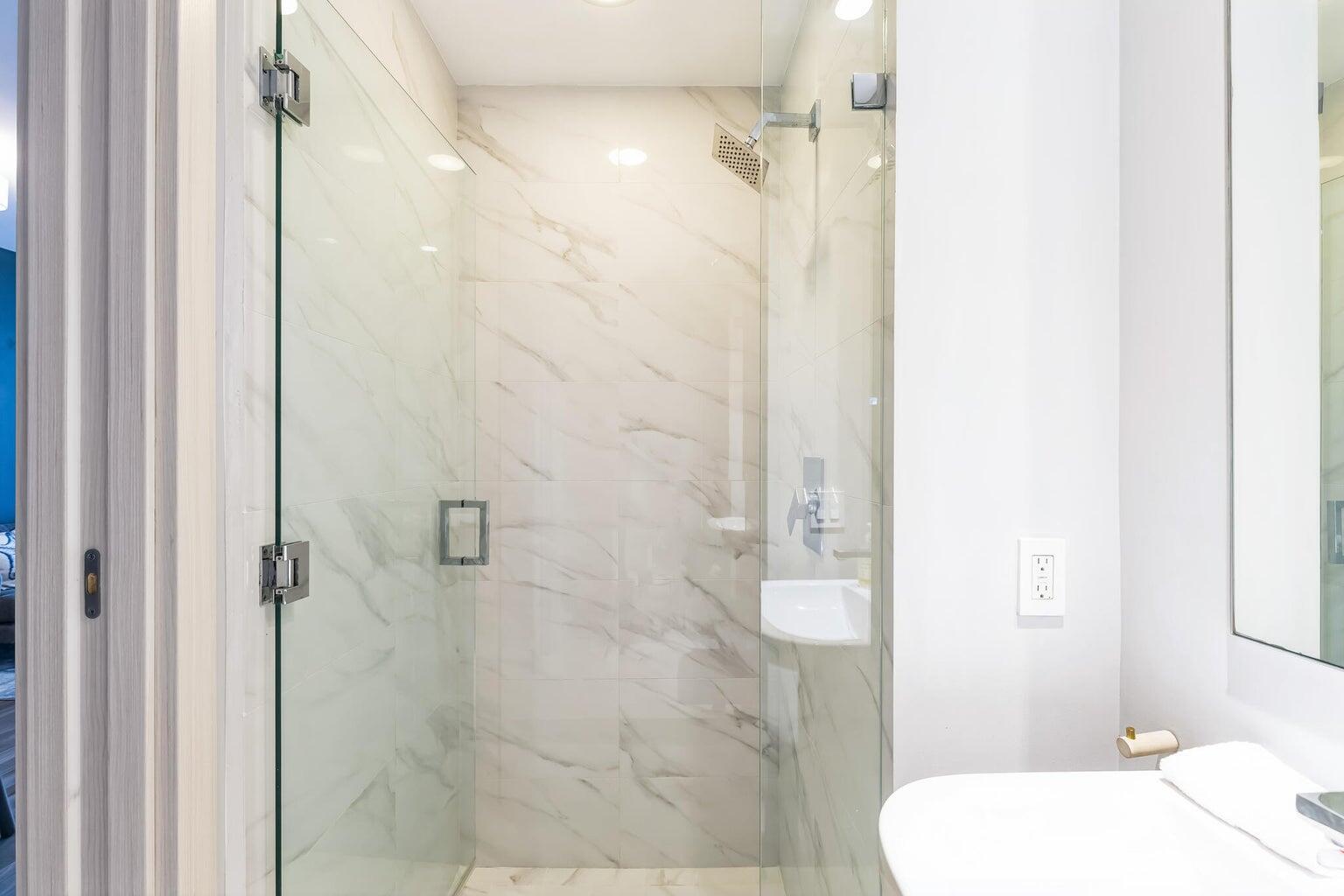 801 South Miami Avenue, Unit 3607 Miami, FL 33131 - Photo 25 of 38 a bathroom with a toilet and a shower